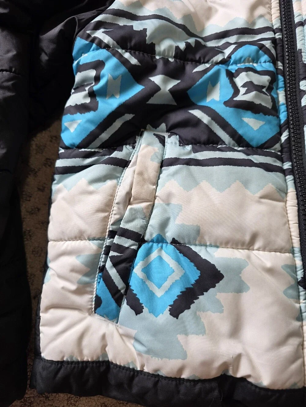 The North Face Girls' Reversible Blue Patterned And Black Puffer Jacket